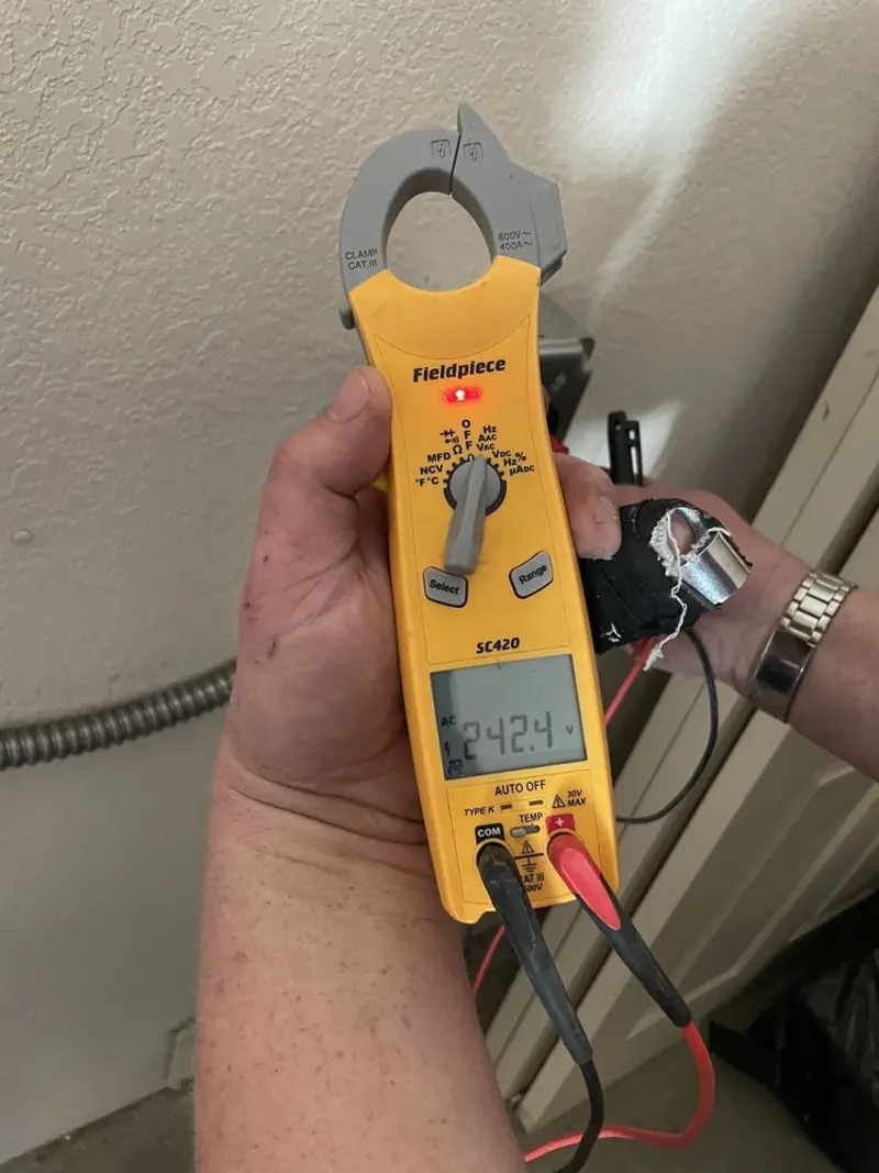 Voltage testing with clamp meter during Generator Installation in Solvang